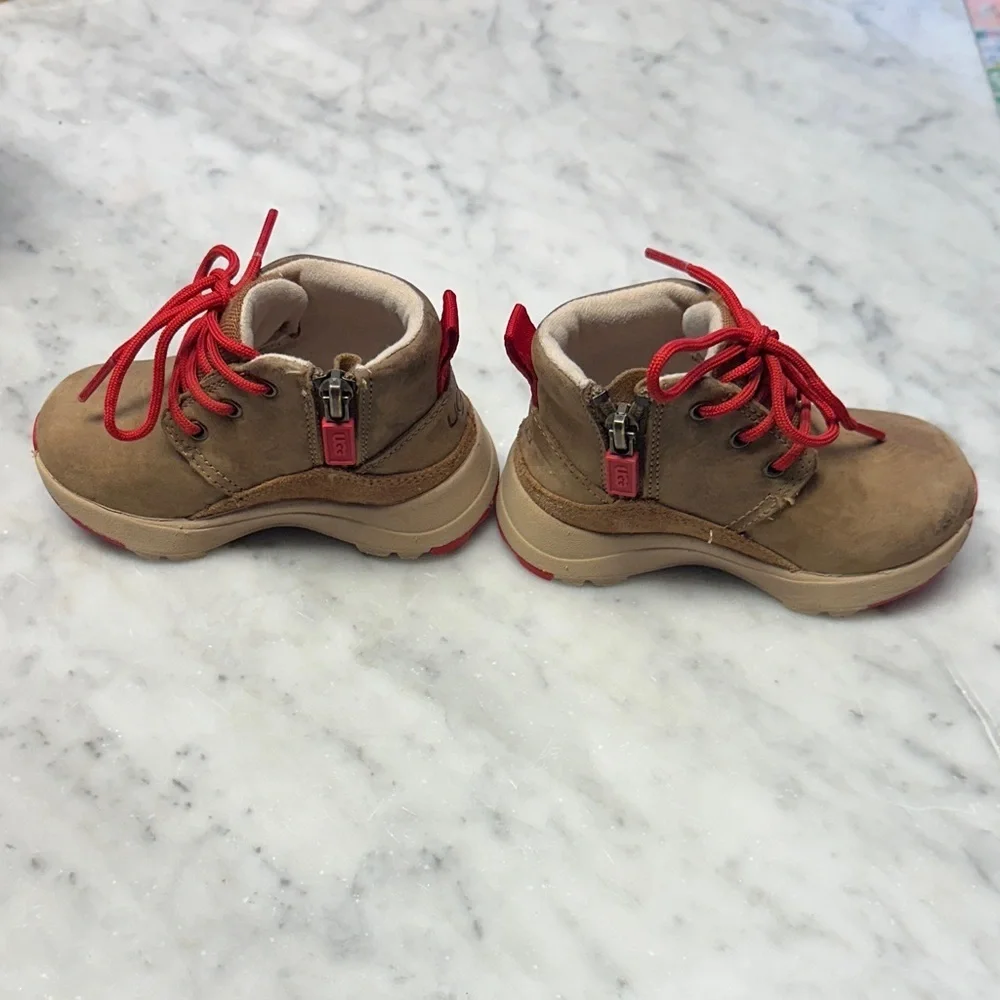 Brown Ugg Boots with Red Accents